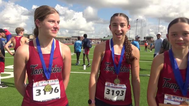 Katy Tompkins wins varsity girl's team title