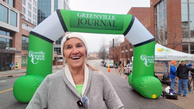 Judy Walls completes her 1,000 race at Run Downtown