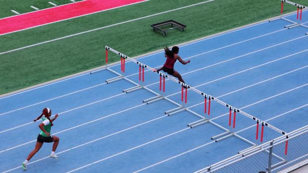 Girls 100 Hurdles Prelims Heat 1