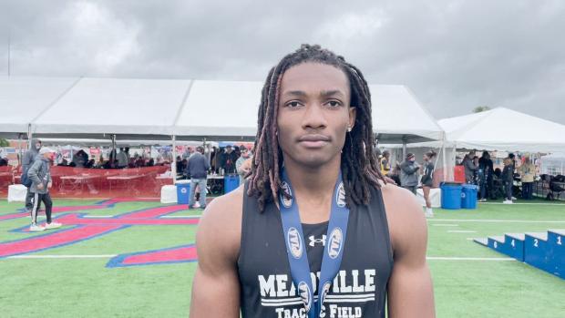 Tymir Phillips after winning AAA long jump on tiebreaker
