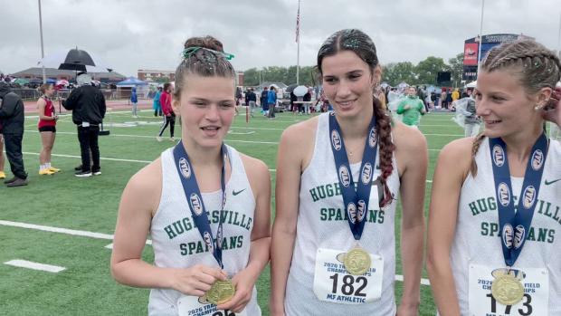 Hughesville after winning the girls AA 4x800