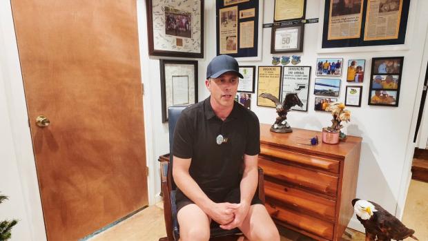 What is Duncan Callahan's role outside of coaching?